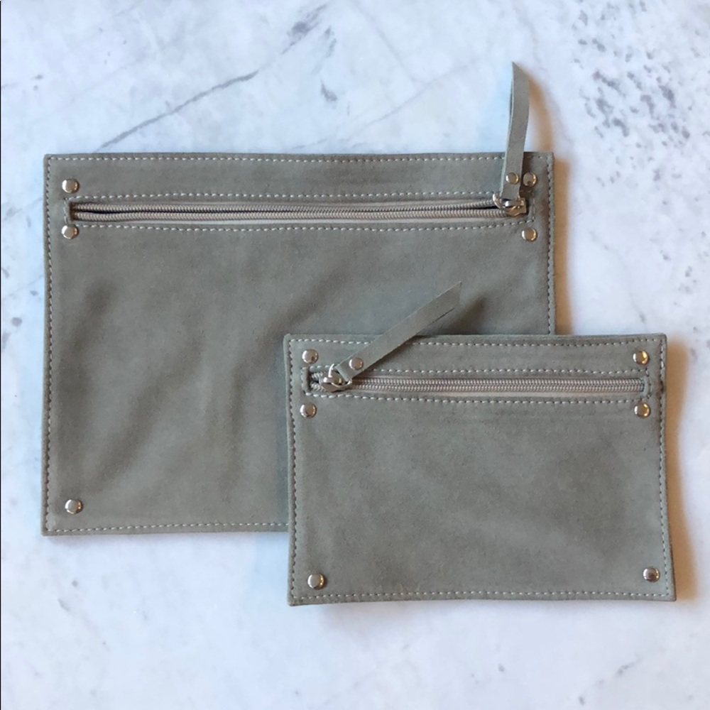 Two wallets in beige suede.